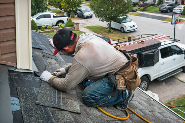 Professional Roofing technician working in Melrose, MA